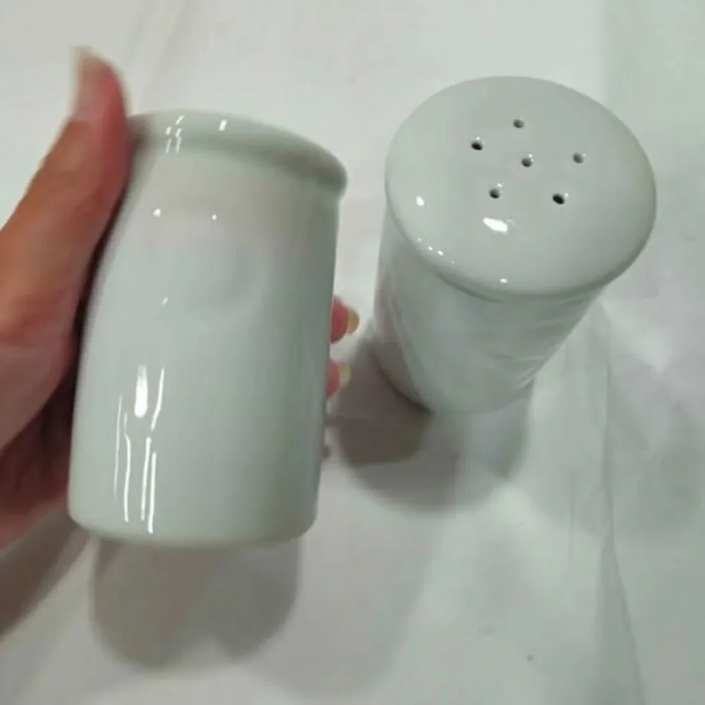 White ceramic salt pepper shakers